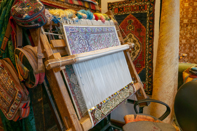 persian carpets being woven